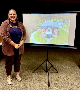 Hannah Frederick presenting information on Montauk Historic Site and their owners the Larrabees.